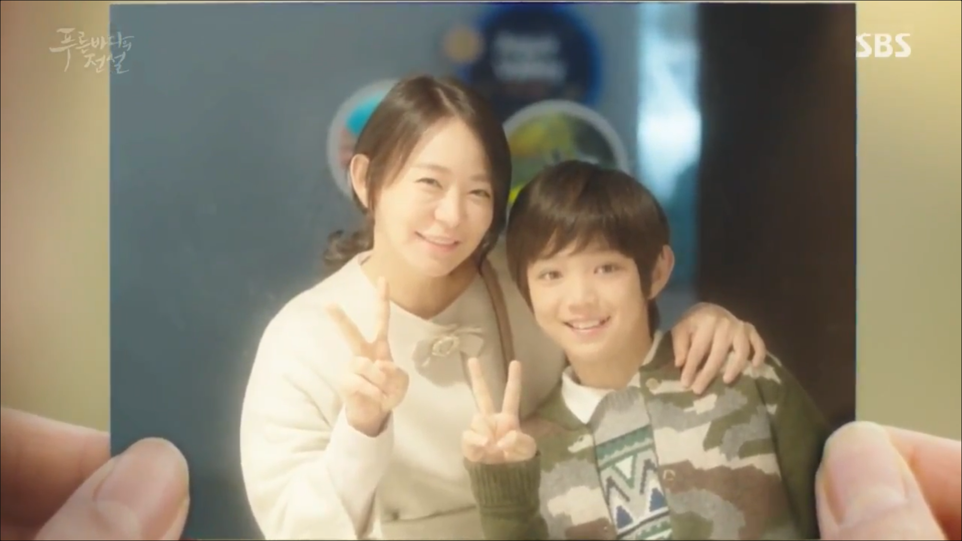 Photo of Heo Joon Jae and his mother when he was younger